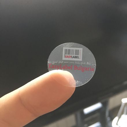 Прозрачен самозалепващ се кръгъл стикер от PVC фолио, Ø25mm, 2 000 бр., без черна марка (репер) -  с перфорация